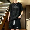Camiseta de manga corta tie-dye con vibra americana para hombre, nueva marca de moda de verano, estilo desgastado, conjunto de dos piezas de moda juvenil