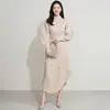 Traje Plegado Estilo Miyake para Mujer, Nuevo Estilo Primavera y Otoño, Top de Media Altura con Mangas de Linterna, Conjunto de Dos Piezas con Falda Irregular