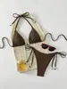 Nuevo conjunto de bikini de un solo color con nudo al frente 2027, traje de baño estilo europeo y americano, traje de baño sexy para vacaciones en la playa para mujer