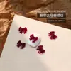 Accesorios Populares para Uñas con Forma de Moño Resina Borgoña Cinta Flujo Mini Pajarita Estéreo Accesorios para Uñas Venta al por Mayor
