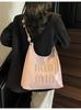Bolsa de Axila com Design de Nicho Transfronteiriço para Mulheres Nova Moda Retro Primavera 2026 Bolsa de Ombro Casual de Grande Capacidade Simples