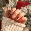 Uñas Portátiles de Navidad Copo de Nieve Amor Brillo Manicura Uñas Postizas Cortas Almendra Mariposa Uñas Largas Europeas y Americanas Venta al por Mayor