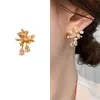 Moda Japonesa y Coreana Pendientes de Fuegos Artificiales con Perlas y Tachuelas de Diamante Super Brillantes para Mujer Accesorios de Pendientes Versátiles de Lujo Ligero de Nicho