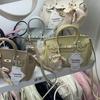 Bolso de diseño de nicho para mujer, novedad de verano de 2025, moderno bolso de platino, bolso de hombro con detalles a juego, bolso cruzado.