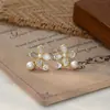 Otoño e Invierno Nuevos Pendientes de Plata S925 con Aguja de Plata Moda Coreana Elegantes Pendientes de Concha y Girasol Pendientes de Perla de Lujo Accesible para Mujer Pendientes