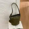 Bolso de axila de nicho retro de alta gama para mujer 2026 nuevo verano bolsa de hombro única con textura tejida de lujo ligero bolso cubo