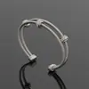 Pulsera de Alambre Trenzado de Acero Inoxidable Transfronteriza de David con un Toque de Alta Gama, Hecha de Aleación de Cobre, Lujo Ligero, Diseño de Nicho, Diseño de Trenzado Abierto