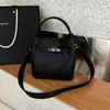 Bolso de Mano Minimalista Popular Transfronterizo 2026 Primavera Nuevo Bolso Cubo de Color Sólido Bolso de Hombro Casual para Viajar Bolso Cruzado