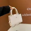 Primavera 2026 Design Casual Fashionável Simples Casual Padrão Trançado Retrô Portátil de Ombro Transversal Pequena Bolsa Quadrada para Mulheres