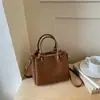 Bolso de mano tejido de otoño transfronterizo para mujer 2026 nuevo diseño de moda bolso de hombro simple bolso cruzado de nicho para el día a día