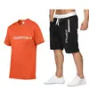 Traje deportivo nuevo de verano 2023 tendencia para hombre traje de shorts y camiseta para fitness y running hombre una generación de pelo