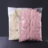 Em estoque atacado jaqueta de penas zíper saco pe transparente fosco casaco algodão-acolchoado jaqueta roupas grande auto-vedante embalagem saco de armazenamento