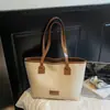 Bolso Tote Retro de Alta Gama de Gran Capacidad para Mujer 2025 Otoño e Invierno Nuevo Bolso de Hombro Versátil para el Trabajo y los Viajes