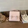 Mochila Novedad Primavera 2026 Estilo Coreano Nicho Linda con Relieve para Mujer, Bolso de Mano Versátil Ligero para Viajes