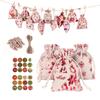 Bolsa de regalo navideña de algodón y lino bronceador en stock, 24 bolsas con cordón navideñas de algodón estampadas con calendario de adviento.
