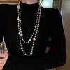 Nuevo collar de perlas artificiales de doble capa apiladas, exquisita cadena de clavícula de moda transfronteriza, elegante cadena de lana ligera de lujo francesa