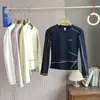 2026 Nova Primavera Ao Ar Livre Estilo Montanha Slim Fit Casual Moda Respirável Bloco de Cores Secagem Rápida Esportiva Manga Longa Camiseta