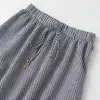 Ropa de Mujer al por Mayor Transfronteriza 2026 Nuevo Estilo Simple Elástico Cuadros Cordón Cintura Ajustada Cuadros Pequeños Falda Midi