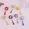 Material hecho a mano tejido flor borla accesorios para cabello largo aretes pinza para el cabello accesorios al por mayor flor de lana DIY