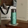 Taza Aislada de Titanio Puro de Gama Alta Ultraligera para Negocios, Taza de Bolsillo Portátil de Alto Valor, Taza de Té de Flor de Titanio de Cristal, Venta al por Mayor en Stock