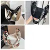 Nuevo bolso de hombro casual de nailon para mujer, versátil, de nicho, para ir al trabajo, bolso cruzado con forma de albóndiga