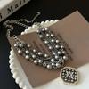 Collar largo de perlas de estilo socialité francés con estrella de diamantes Mang, tejido multicapa apilado, nuevo collar de plata gris, cadena para clavícula.