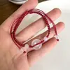 Nova Fivela de Segurança de Calcedônia Sintética Pulseira para Meninos Pulseira de Design de Nicho para Casais Acessórios Trançados com Corda Vermelha do Ano Animal