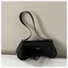 Bolso cruzado de diseño de nicho en forma de media luna de comercio exterior nuevo, moderno, de alta gama, versátil, bolso de mano para mujer para el trabajo, a la moda