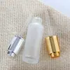 Botella dispensadora de aceite esencial esmerilada con hombro plano, cabezal de bomba de presión, frasco gotero, botella cosmética de vidrio transparente portátil de 15-50 ml