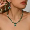 Moda Europea y Americana Verde Azul Rojo Pedrería Conjunto de Collar Pendientes Pulsera Anillo Amazon Estilo Caliente Cuatro Piezas Completamente de Diamante