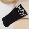 Calcetines apilados para niños, otoño e invierno, nuevos calcetines de tubo medio con perlas de un solo color, calcetines de princesa con lazo y perlas.