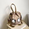 2025 Nuevo Estilo Bolso Cruzado de Hombro Casual Personalizado Bolsa Cubo Casual de Tela de Nylon con Caricatura Divertida de Ojos Grandes para Mujeres