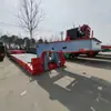 Fábrica de Origen Exporta Remolque de Plataforma Baja de 4 Líneas y 8 Ejes para Transporte de Mercancías Grandes, Remolque de Eje-Línea de 80 Toneladas y 100 Toneladas