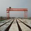 Suministros del Fabricante Profesional 12- 35m Especificaciones Completas Shengyuan Grúa de Conducción Campo de Carga Grúa Pórtico de 50 Toneladas