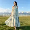 Vestido Estilo Francês 2026 Novo Modelo Estilo Férias Yunnan Sanya Vestido Longo com Alça de Amarrar na Nuca, Malha Plissada