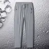 Pantalones casuales para hombre, de seda de hielo, finos, de secado rápido, deportivos, holgados, de talla grande, de primavera y otoño, de pierna recta.