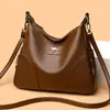 Bolsa Simples para Mulher de Meia-Idade Bolsa de Ombro 2024 Nova Moda Couro PU Macio Bolsa Meia-Lua Comércio Exterior Portátil Bolsa Transversal