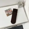 Calcetines tobilleros sin costuras color café para mujer, otoño e invierno, resistentes al olor, absorbentes de sudor, versátiles, básicos de algodón de color liso, calcetines largos para otoño