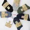 Calcetines para hombre y mujer calcetines de algodón otoño e invierno media pantorrilla negro puro blanco rosa burdeos amarillo verde morado calcetines de hombre calcetines de mujer fábrica al por mayor puesto callejero