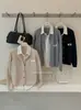 Y.JIA 2026 Otoño Estilo Coreano para Ir al Trabajo Diseño de Dos Piezas Falsas Patchwork de Lino Cardigan de Punto Trenzado 577