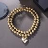 Collar Cibernético Europeo y Americano Transfronterizo Exagerado de Dos Piezas Multicapa de Cuentas Redondas Apiladas con Colgante de Corazón CCB Cadena para el Cuello