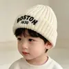 Gorro de punto protector para orejas de niño, estilo coreano, cálido, unisex, a prueba de viento para invierno, versátil, gorro de lana para bebé para poner