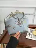 Bolsa Dorada Simple de Moda China de Tela 2025 Invierno Nuevo Bolso Bandolera con Cadena para Mujer Versátil Bolso de Noche Cheongsam