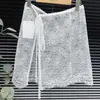 Falda de una pieza estilo coreano con cordones y ribete de encaje transparente, falda de longitud media con capas atmosféricas