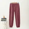 Nuevos estilos de otoño e invierno: Pantalones jogger de cuadros para mujer, cálidos, forrados de polar, de tiro alto, adecuados para madres de mediana edad, y se pueden usar como ropa exterior