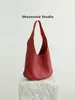 Bolsa Feminina de Couro Genuíno Explosiva Transfronteiriça Moda Simples Estilo Preguiçoso Bolsa Tote de Grande Capacidade Bolsa de Ombro/Axila de Alto Padrão