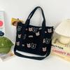Bolso de hombro de lona de gran capacidad y combinable para estudiantes, bolso de compras portátil, bonito bolso con diseño de oso AB, venta al por mayor