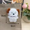 Nuevo Colgante de Cachorro con Cuello de Felpa Colgante de Muñeca de Dibujos Animados Creativo Decoración de Llavero para Mochila de Niña Venta al por Mayor