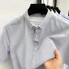 Camisa de Linho Masculina 2026 Verão Nova Moda Casual Simples Cor Sólida Lapela Camisa Masculina de Manga Curta Atacado