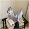 Bolso de mujer moderno, casual, único y sencillo con una textura de moda, nuevo bolso tipo dumpling de nicho 2026 para llevar al hombro o cruzado